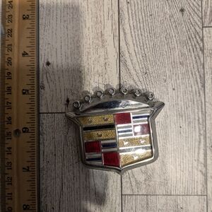 Cadillac Emblem with Red and Gold Accents